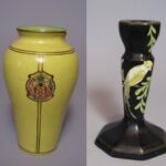 Side by side images of a yellow vase with a coat of arms, and a black candle stick with green leaves and a bird