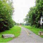 Colour photograph of a cycle trail and playground